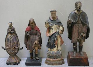 A Group of 4 Antique Santos Figures.