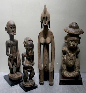 4 African Carvings - A Carved Figure, Baule Female