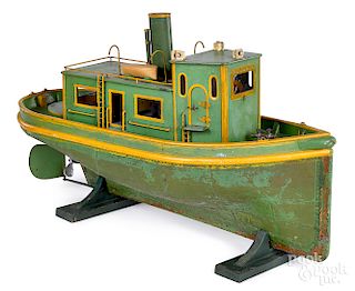 Large live steam painted tugboat with copper hull