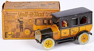 Strauss Yell-O-Taxi tin lithograph wind-up