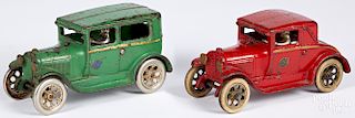 Two Arcade cast iron Ford cars