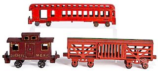 Three cast iron train cars - Kenton. etc.