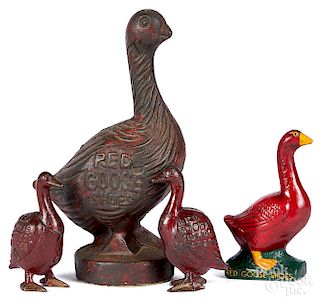 Three cast iron Red Goose Shoes still banks