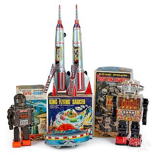 Five tin battery operated space toys