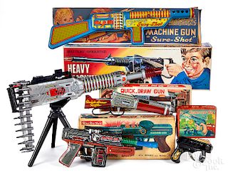 Five tin lithograph toy guns with OB