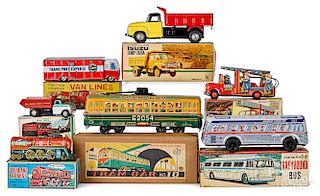 Seven Japanese tin toys with original boxes
