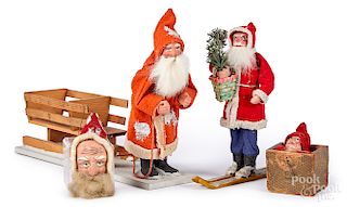Four German composition Santa Claus figures