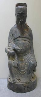 A Large Carved Wooden Chinese Figure of a Scholar