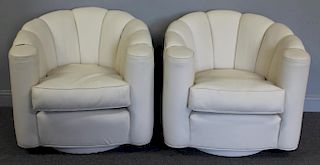 Pair of Leather Upholstered Swivel Chairs