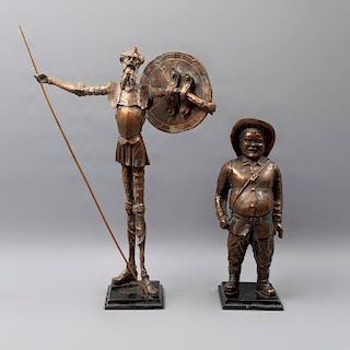 Don Quijote y Sancho. Siglo XX. Elaborados en resina. Acabado a manera de cobre. Con bases. 57 x 41 x 11 cm y 38 x 11 x 10 cm.