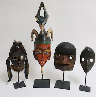 4 African Carved & Polychromed Wood Masks