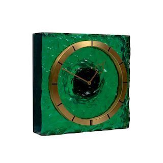 Jaeger-LeCoultre. Reloj de mesa. Suiza, años 60. Movimiento manual de 50 mm. Ø. Caja de resina verde, acabado pétreo.