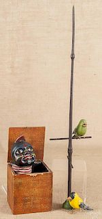 Pair of Paul Tyson carved and painted birds on a