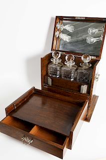 Oak and Silver Plate Mounted Tantalus with Three Crystal Decanters