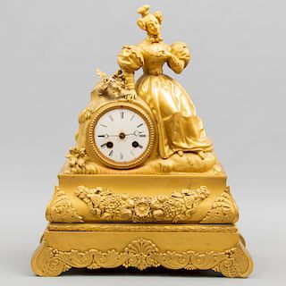 Reloj de chimenea. Origen europeo. 1969. Elaborado en bronce dorado. Mecanismo de cuerda y pŽndulo. 40 x 33 x 12 cm.