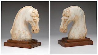 Two Chinese carved marble busts of horses