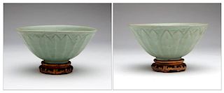 A pair of Chinese celadon glazed ceramic bowls