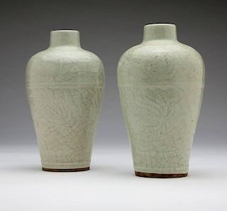 A pair of Chinese light celadon vases