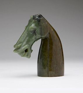 A Chinese carved nephrite head of a horse