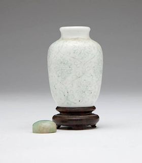 A Chinese porcelain famille rose medicine bottle