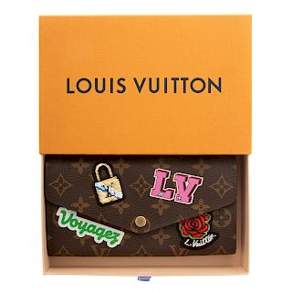 A Louis Vuitton Embellished Sarah Wallet
