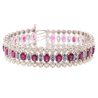 A Ladies Ruby, Diamond & Sapphire Bracelet in 14K