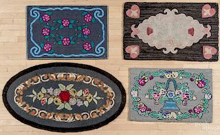 Four American floral hooked rugs, mid 20th c.