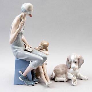 Figuras de payaso con niña y cachorro. España, siglo XX. Elaborados en porceana Lladró acabado brillante. Piezas: 2