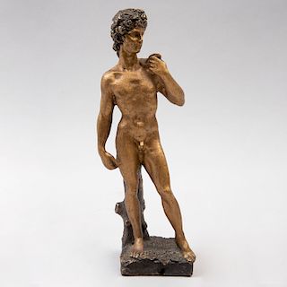 Reproducción del David de Miguel Ángel.. Fundición en bronce dorado. 21.5 cm de altura.