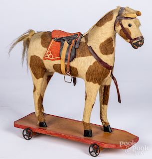 Dappled mohair platform horse pull toy
