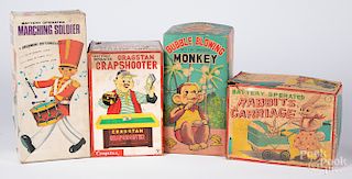 Four battery operated toys