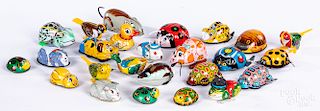 Twenty-four small Japanese tin mechanical toys
