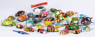Thirty-one small Japanese tin mechanical toys