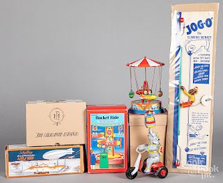 Group of modern tin lithograph wind-up toys