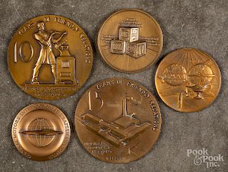 Five bronze automotive related medals