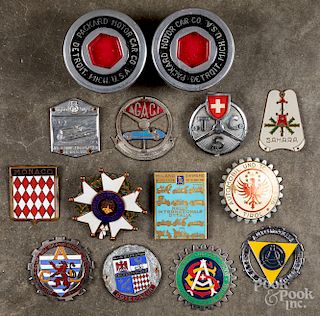 Collection of car license badges