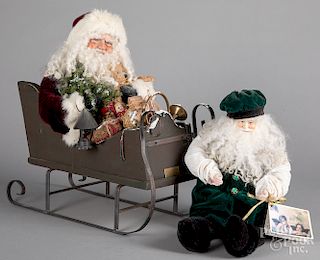 Two Santa Claus artisan dolls