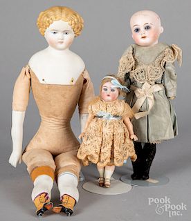 Three bisque and china head dolls