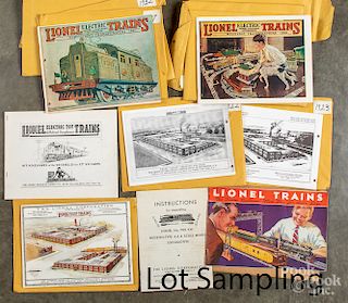 Group of reproduction Lionel train catalogues.