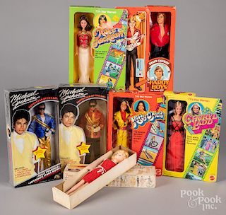 Seven vintage TV personality dolls