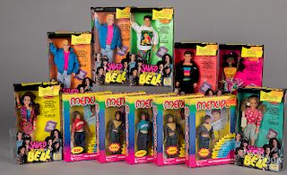 Twelve boxed TV personality dolls