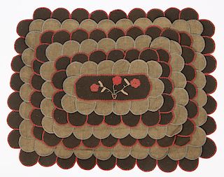 American Felt Penny Rug with hand embroidery.
