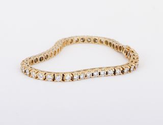 Ladies 18kt. yellow gold diamond tennis bracelet