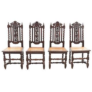 Lote de 4 sillas. Francia. Siglo XX. En talla de madera de nogal. Con respaldos semiabiertos y asiento de bejuco.