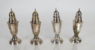 Four Sterling Silver Casters