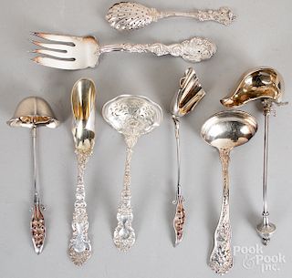 Eight sterling silver serving utensils