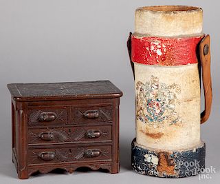 Leather fire bucket and a miniature dresser
