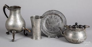 Four pieces of engraved Continental pewter