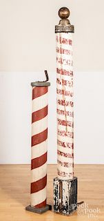 Two painted barber poles