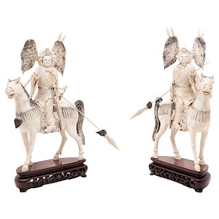 IMPERIAL COUPLE ON HORSEBACK WITH ARMOR AND SPEARS. CHINA, 20TH CENTURY. Carved in ivory with sgraffito in ink and articulated pieces.
